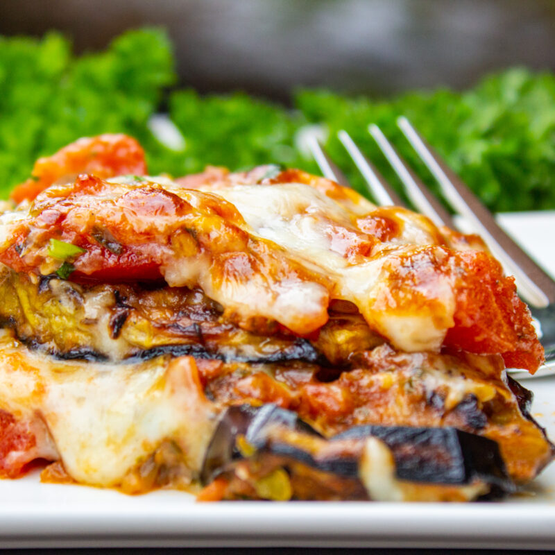 piece of eggplant parmesan  on plate