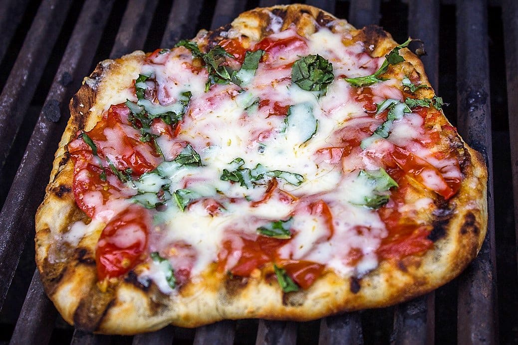 pizza on grill cooking