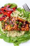 ceder planked salmon on bed of quinoa and spinach with grilled peppers p2