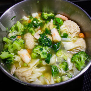 vegetable wonton soup in a pot f
