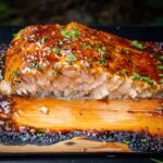 cooked glazed salmon on plank f