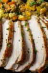 sous vide turkey breast sliced on plate with stuffing p3