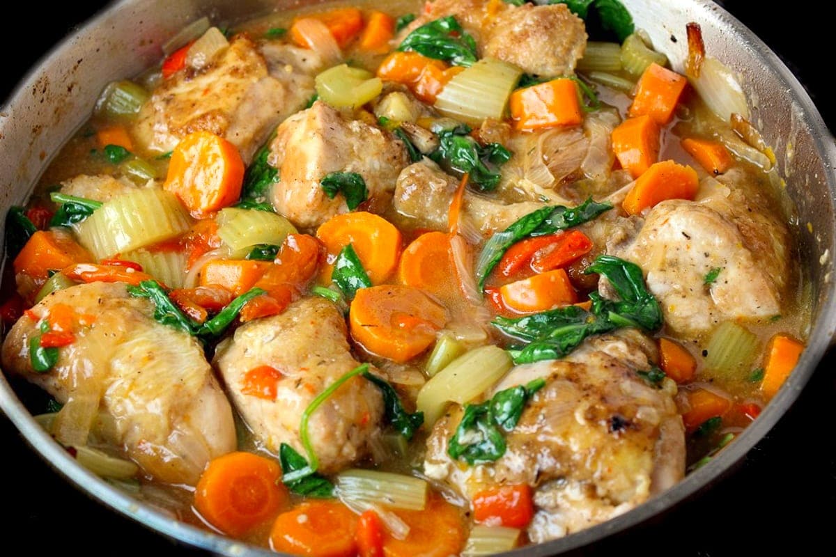 chicken and vegetables in sauce in skillet 2