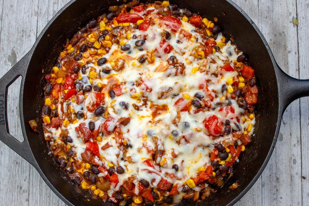 cheese and Mexican mixture in pan
