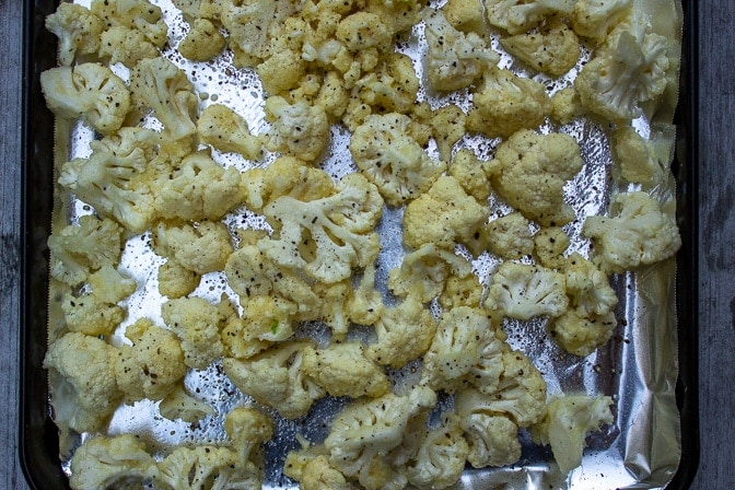 parmesan coated florets on foil lined pan