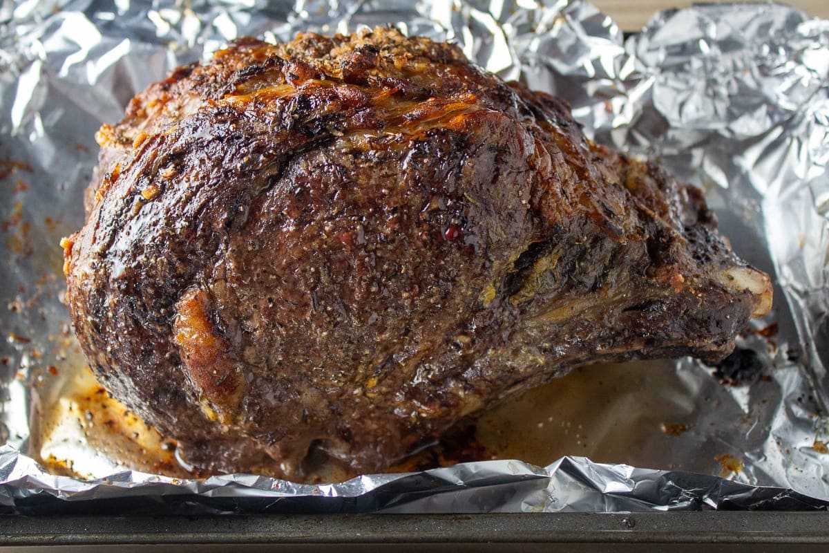 prime rib roast in pan browned and crusted