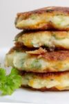 4 Mashed Potato Pancakes (Latkes) stacked on plate