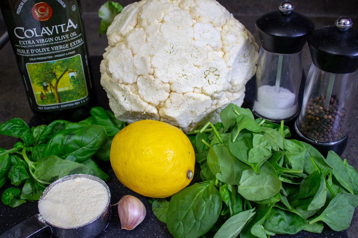 Cauliflower, basil, spinach, parmesan, salt, pepper, lemon, garlic, oil