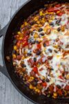 mexican topping with cheese in skillet p