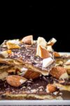 caramel and chocolate coated matzo with nuts on plate p