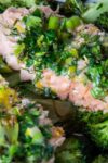 two Lemon Herb Baked Trout fillets on boy choy on plate p