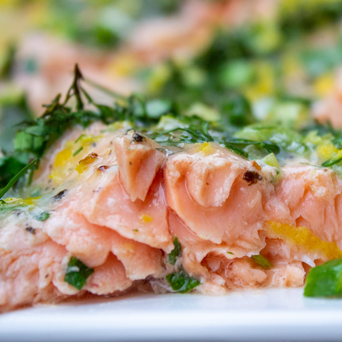 piece of lemon herb baked trout on plate