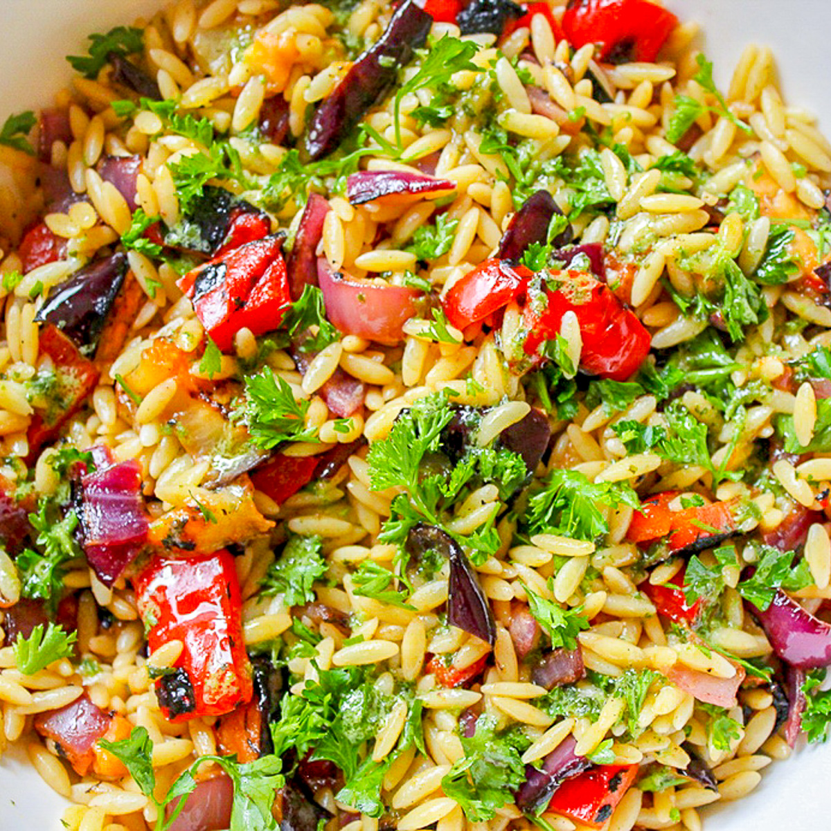 orzo pasta salad with grilled veggies in bowl