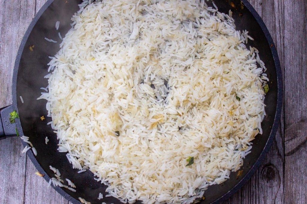 rice frying in pan