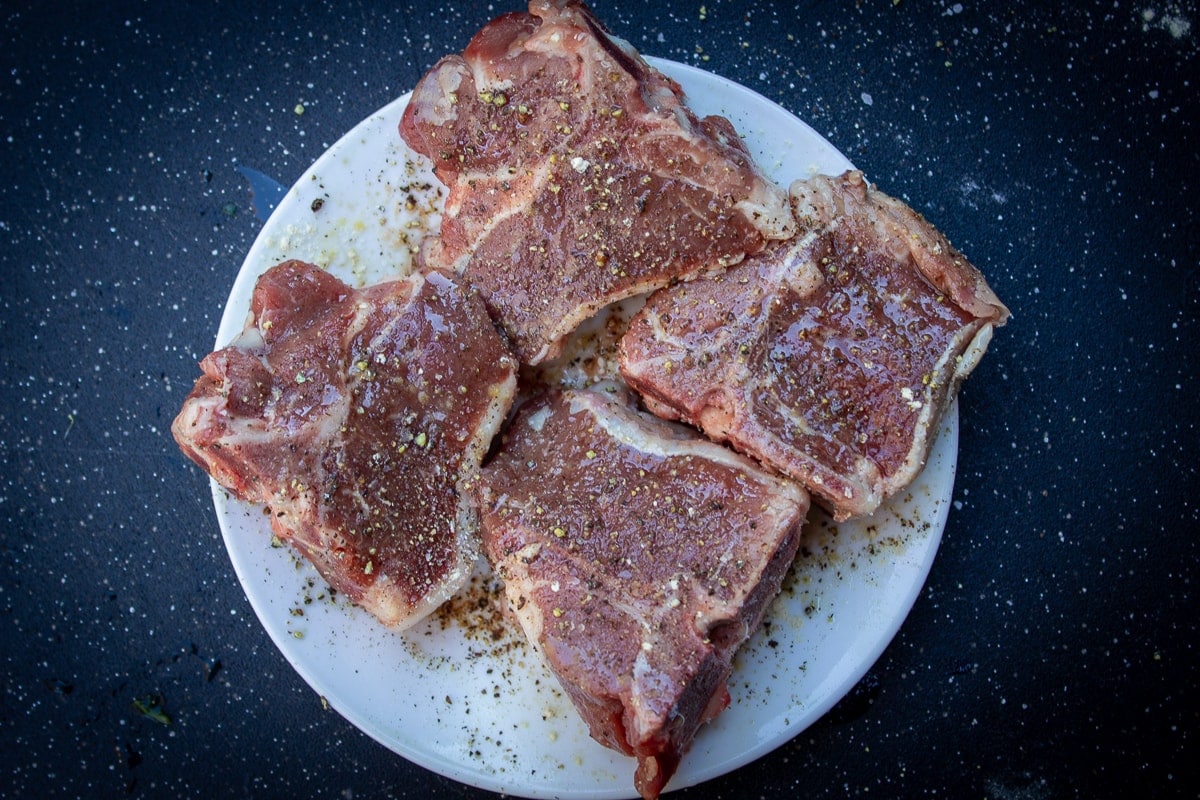 seasoned lamb chops on plate
