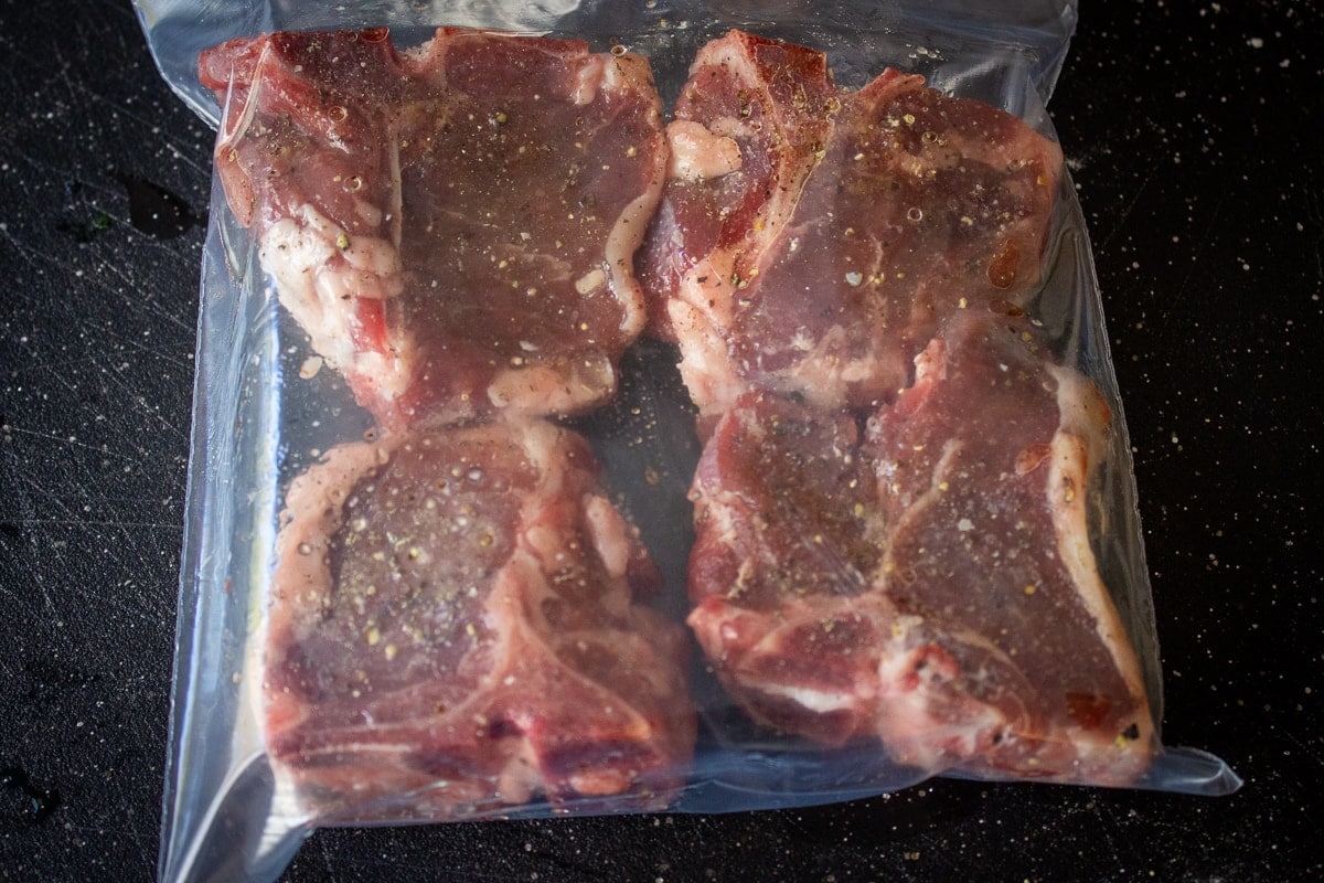 seasoned lamb chops in ziploc bag