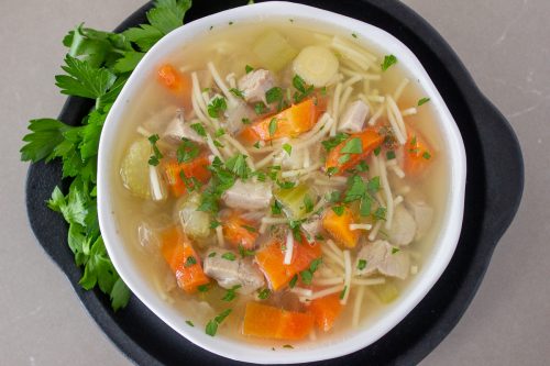 bowl of turkey soup with noodles 1