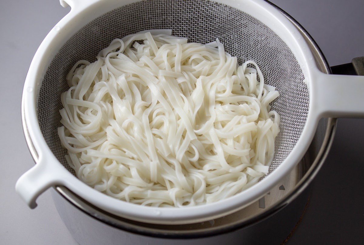 rice noodles reconstituted in colander