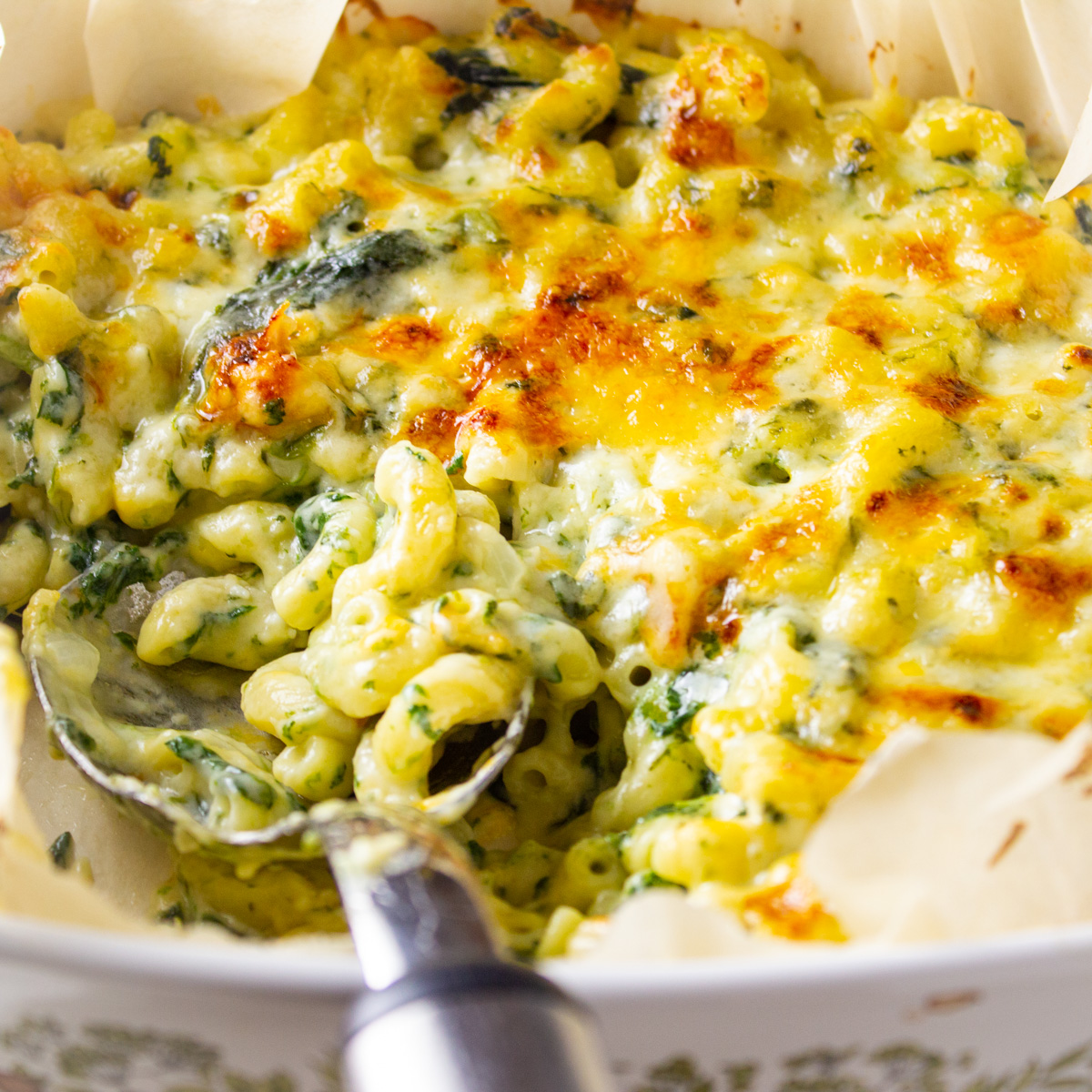 spinach mac and cheese in casserole dish