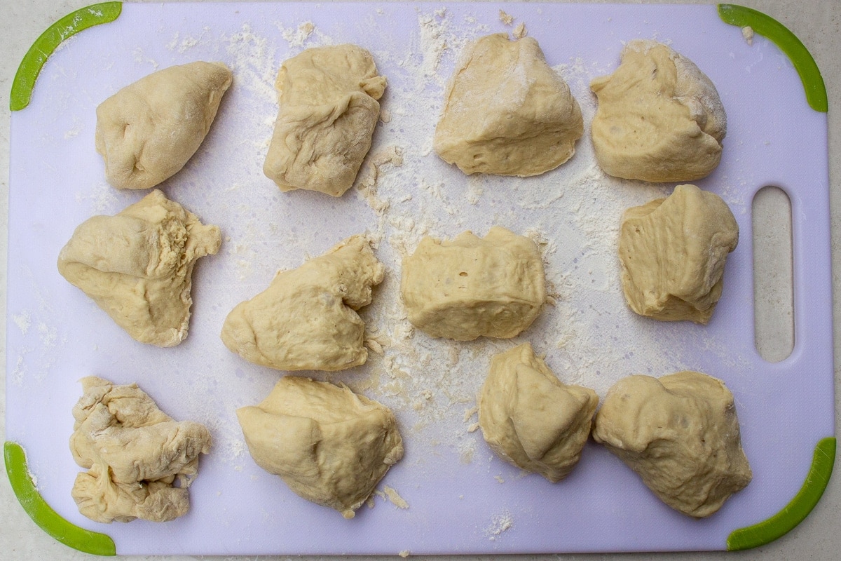 proofed dough cut into 12 pieces