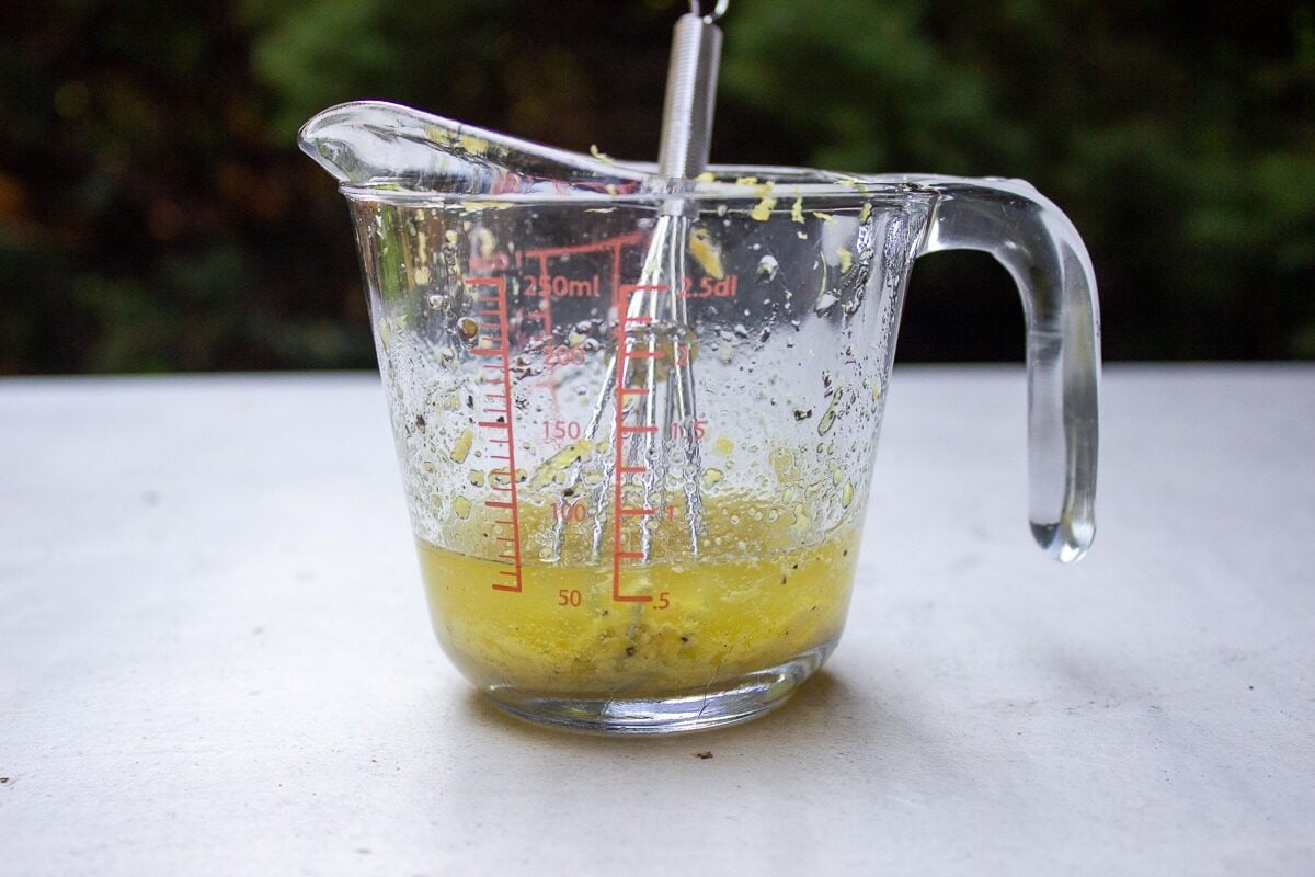 vinaigrette dressing in measuring cup