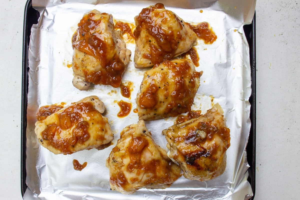 sous vide chicken thighs with glaze on pan