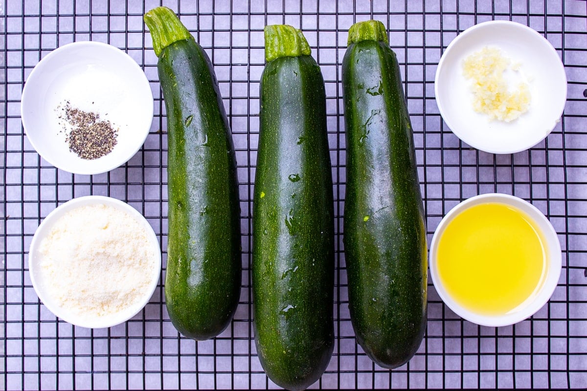 zucchinis, olive oil, garlic, parmesan, salt, pepper