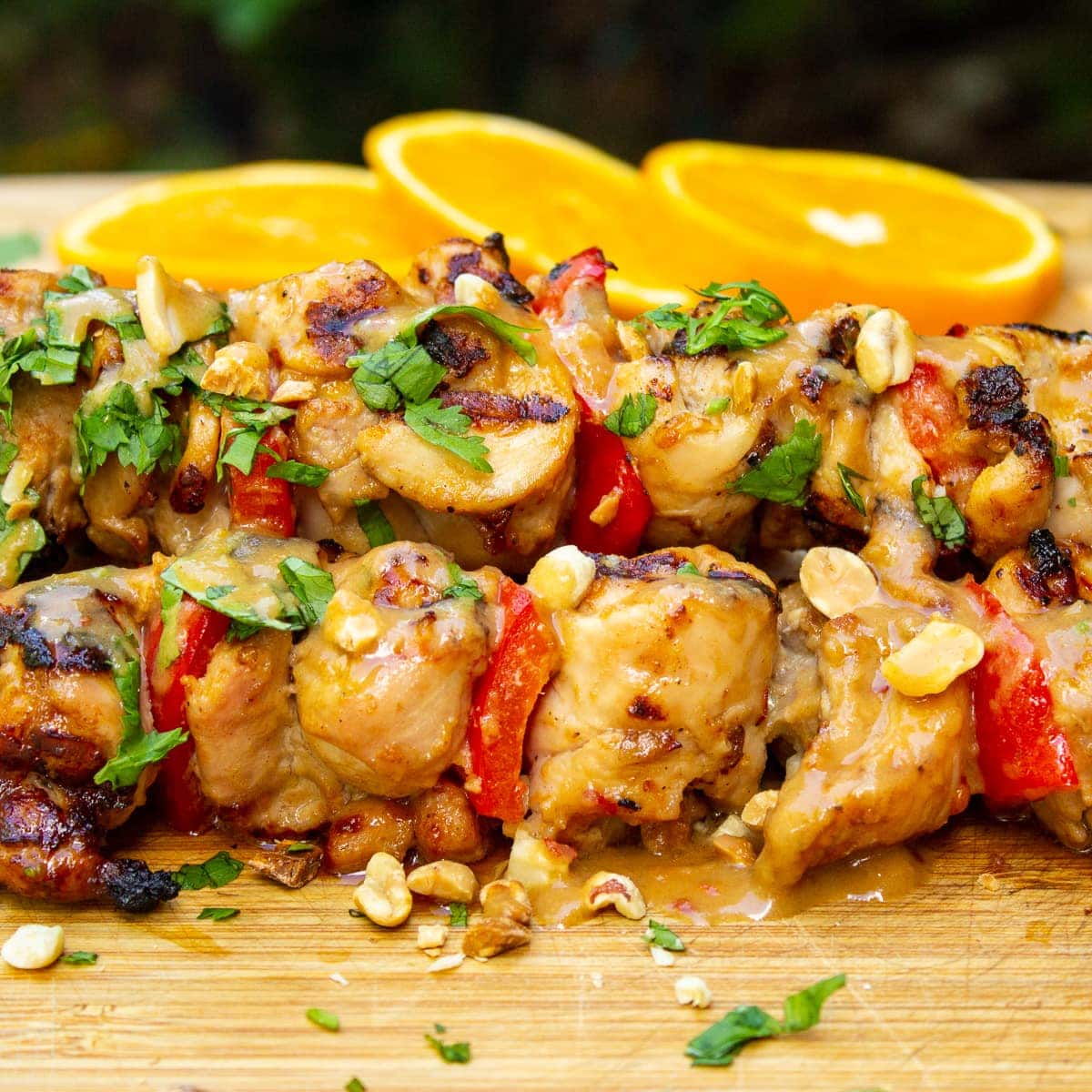 cooked chicken skewers on cutting board 3