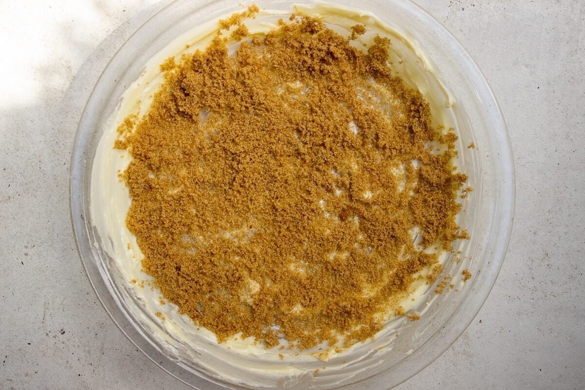 butter and brown sugar in pie plate