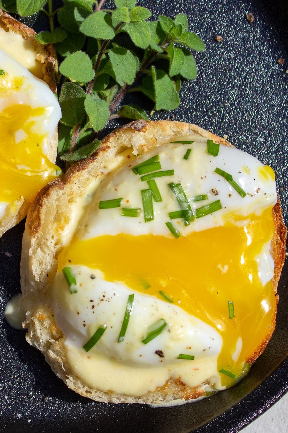 sous vide poached egg cut open over English muffin p1