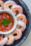 shrimp cocktail in bowl with cocktail sauce