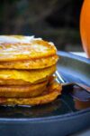 stack of pumpkin pancakes on plate p1