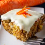 piece of carrot cake with pineapple on plate 5
