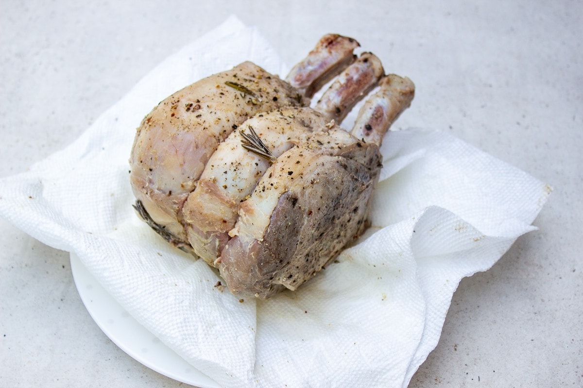 cooked pork roast on paper towels