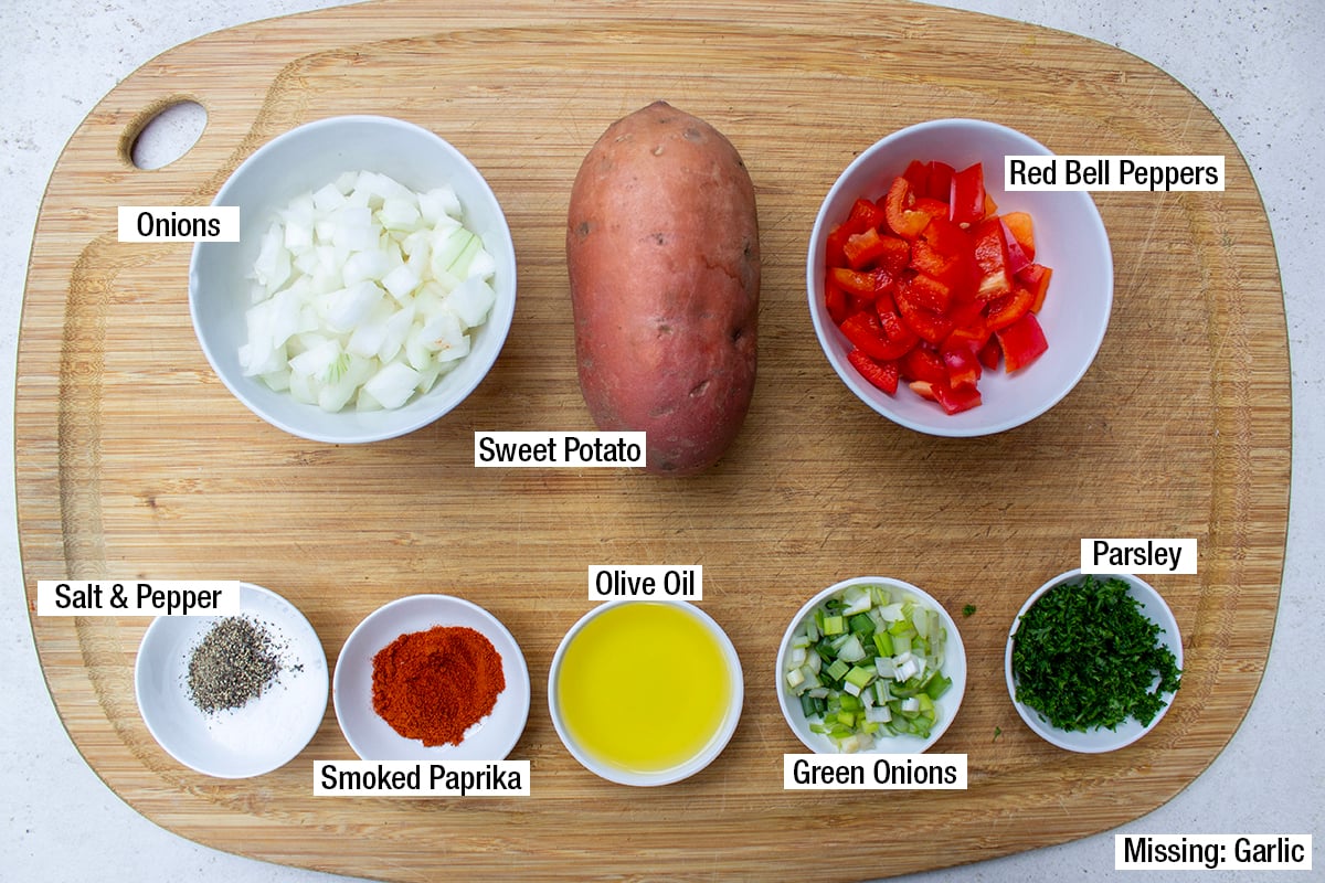 Sweet potato, onions, red bell peppers, smoked paprika, olive oil, green onions, parsley, salt, pepper.