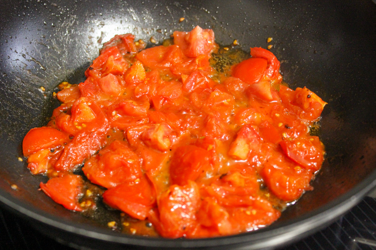 sauteed tomatoes in skillet