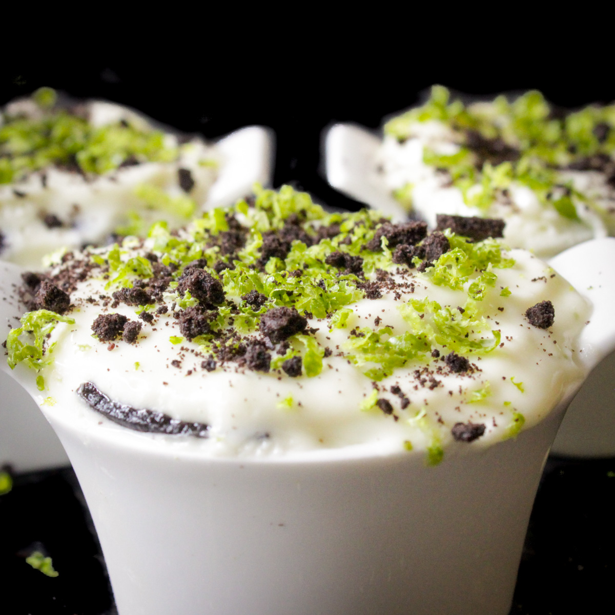 3 key lime dessert cups on table