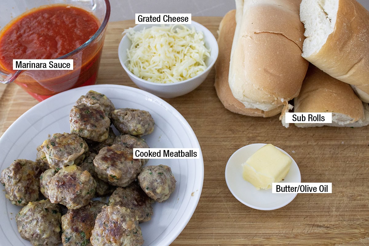 Cooked meatballs, marinara sauce , grated cheese, sub rolls, butter or olive oil.