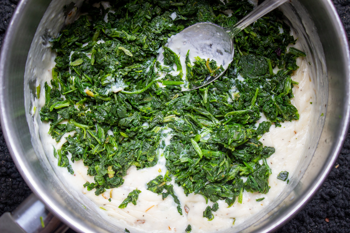 spinach and cream sauce in pot