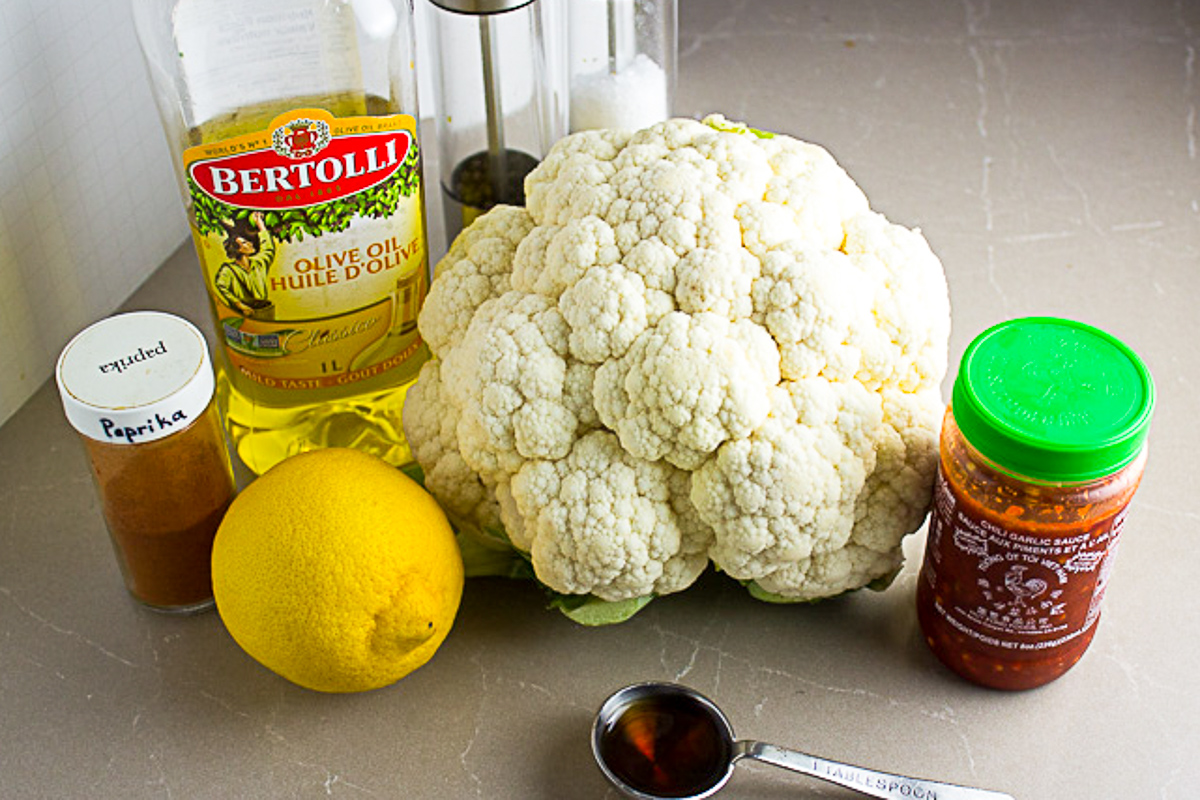 whole cauliflower, lemon, oil, seasonings