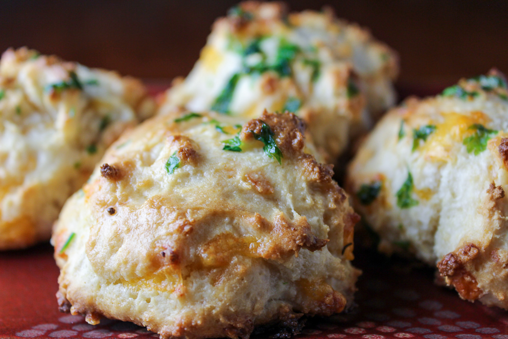 several cheddar biscuits on plate 1