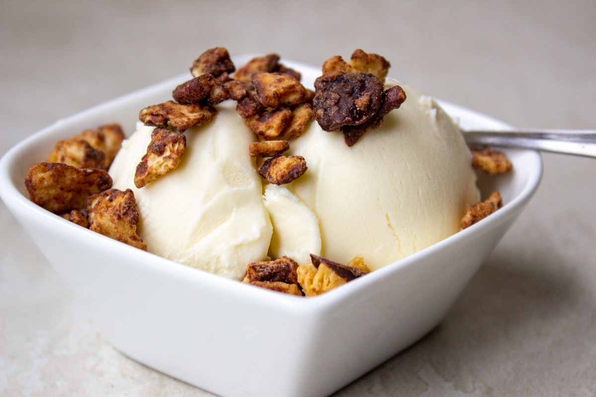 caramel matzo crunch on ice cream in bowl