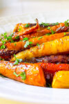 maple glazed carrot tzimmes on plate