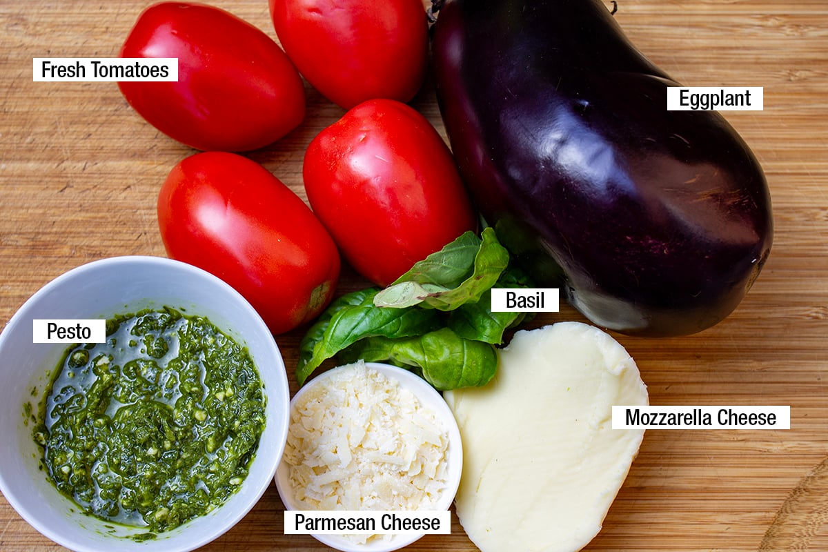 Eggplant, fresh tomatoes, pesto, mozzarella cheese, parmesan cheese, basil.