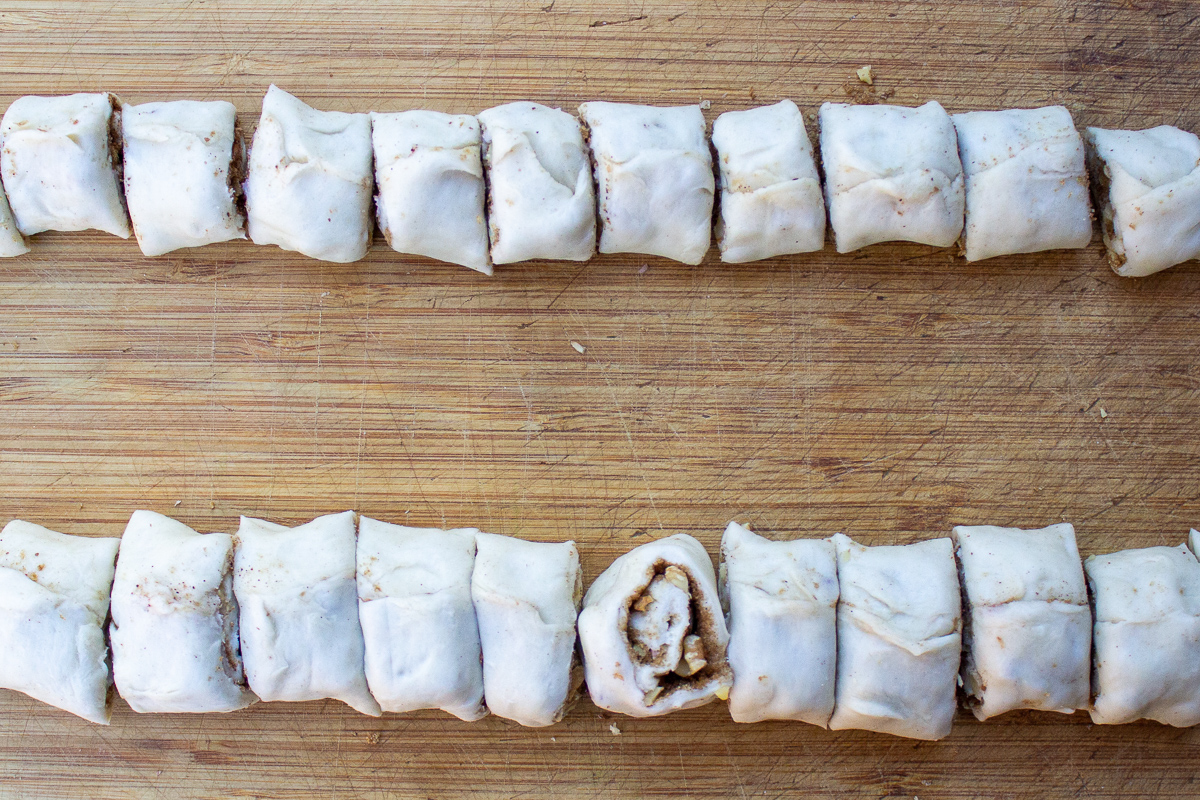 two logs or rolls of filled puff pastry cut into 12 pieces each