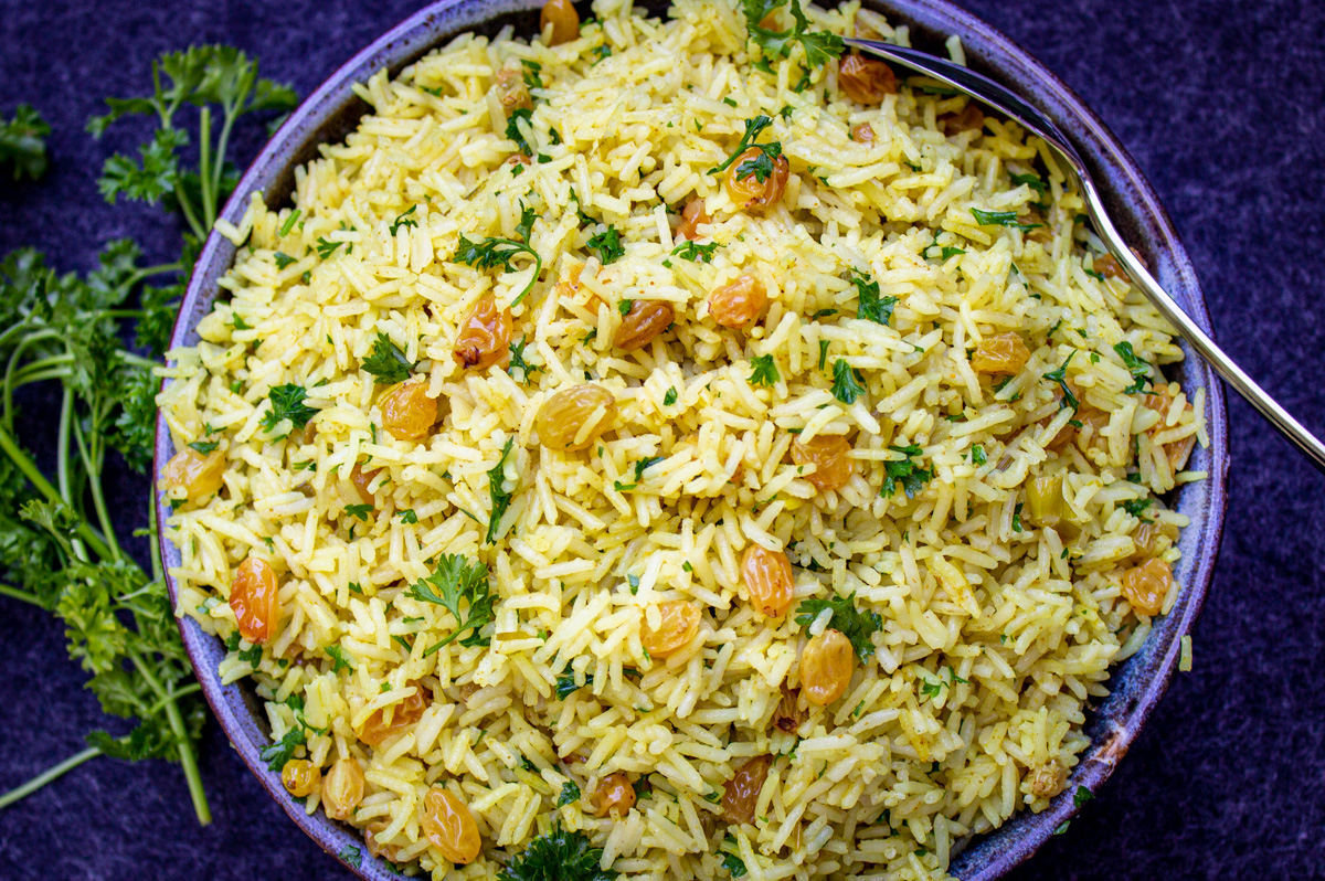 bowl of curried rice and raisins