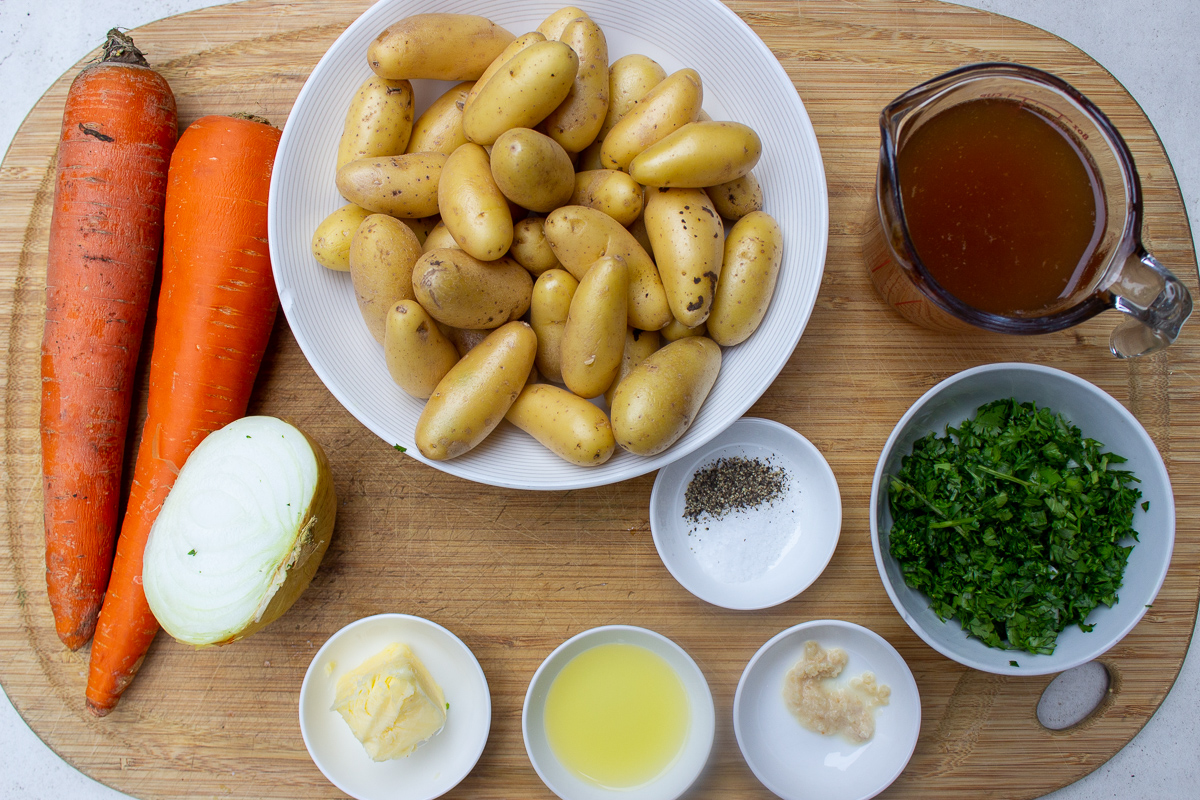 fingerling potatoes, carrots, herbs, garlic, butter, oil, broth, salt, pepper