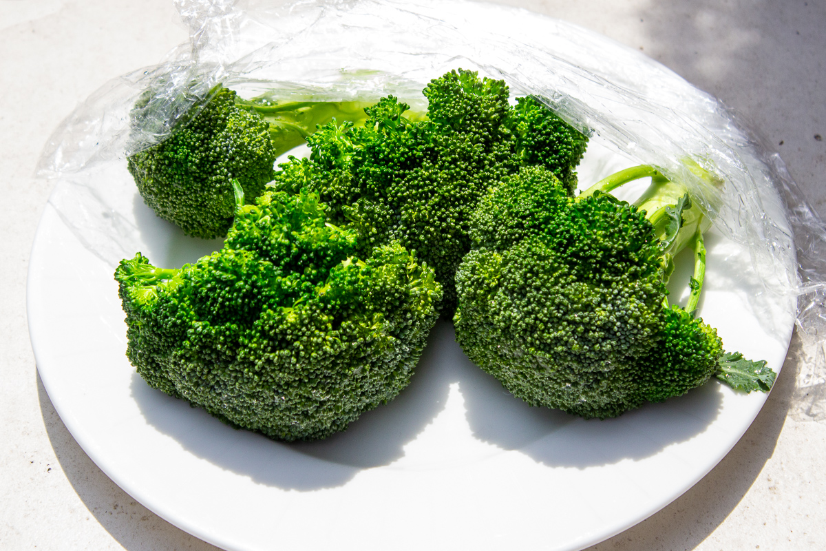 blanched broccoli on white plate