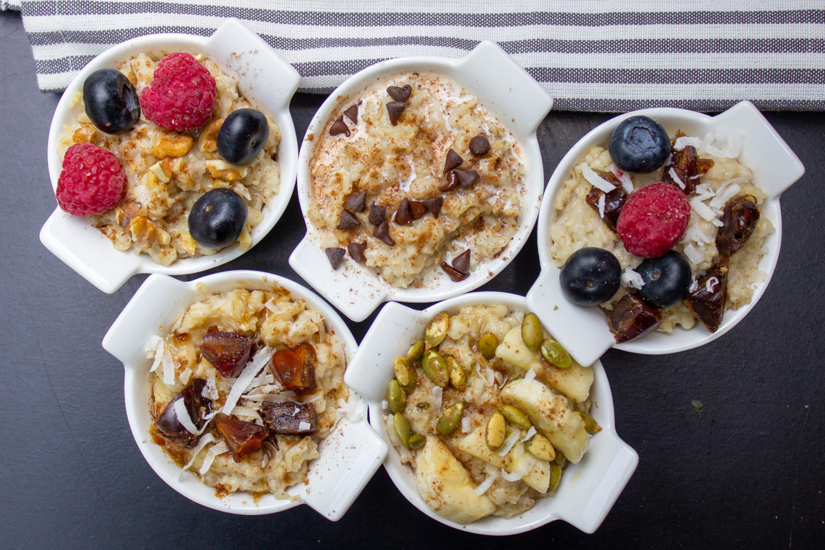 5 mini bowls of oatmeal with various toppings