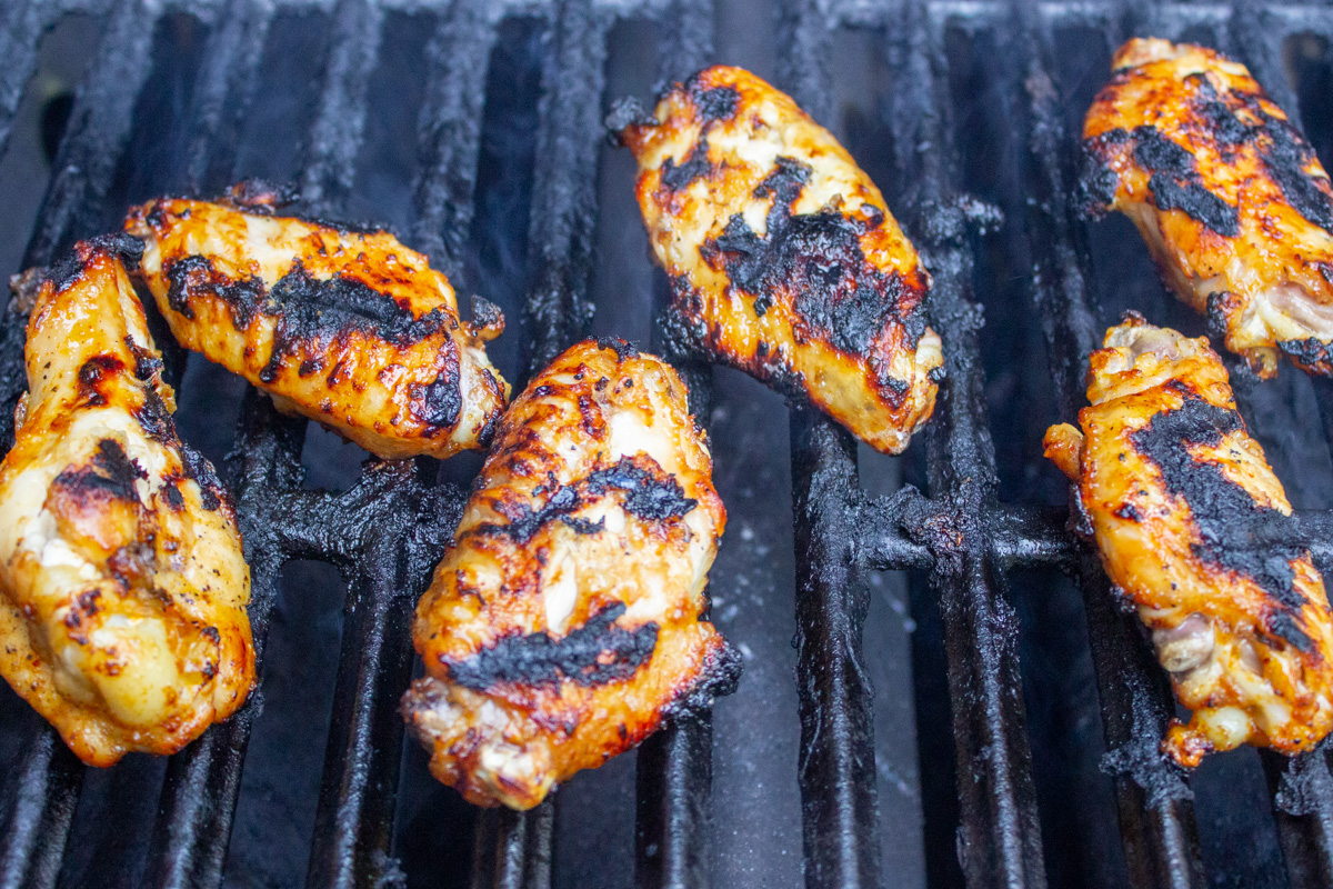 wings with sauce on grill